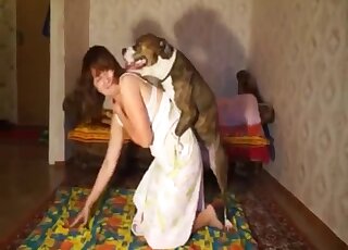 Lingerie-wearing lady getting fucked by a dog