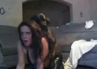 Zoophile in leather pants fucks her BF and pet